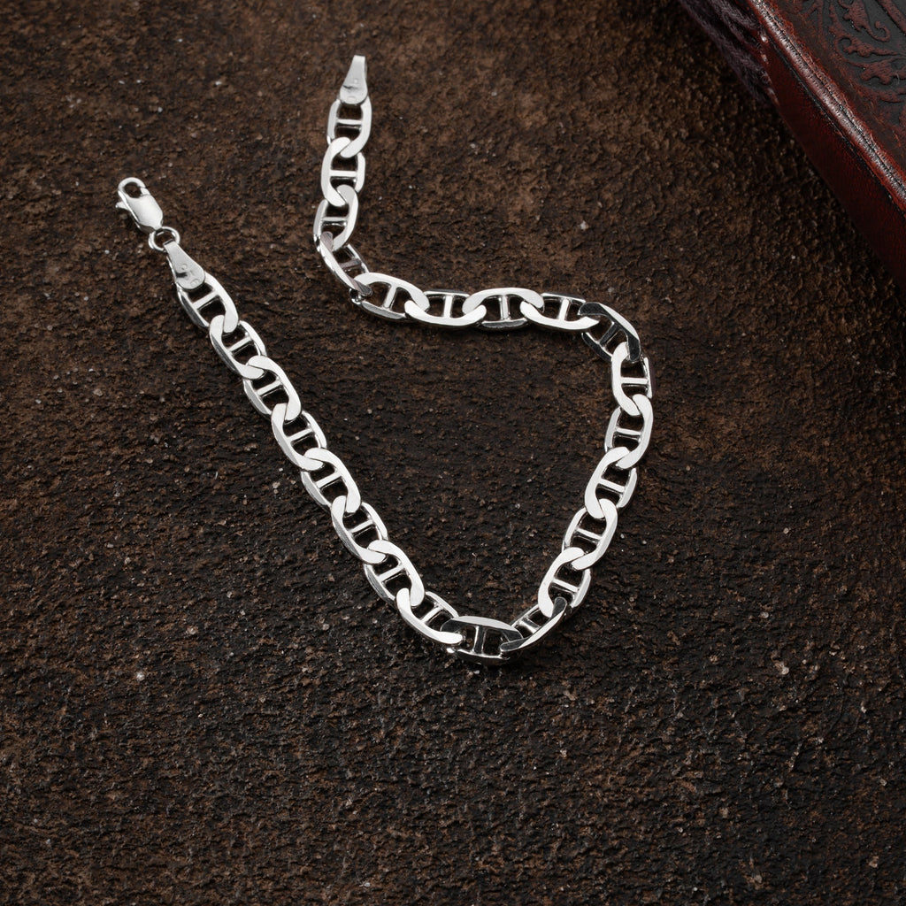 Cuban Link Armband 6mm aus 925 Silber von Ketten Boss, das glänzend und robust aussieht, mit kräftigen Gliedern.